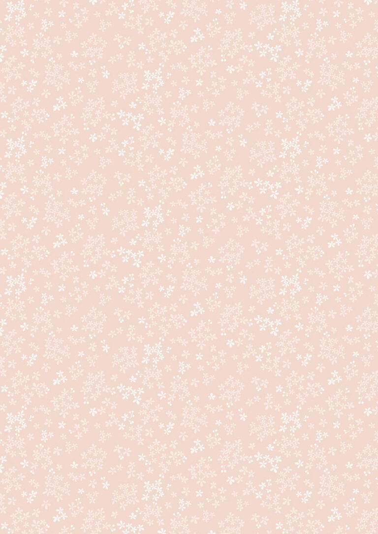 Patterned fabric with small white flowers on a light pink background