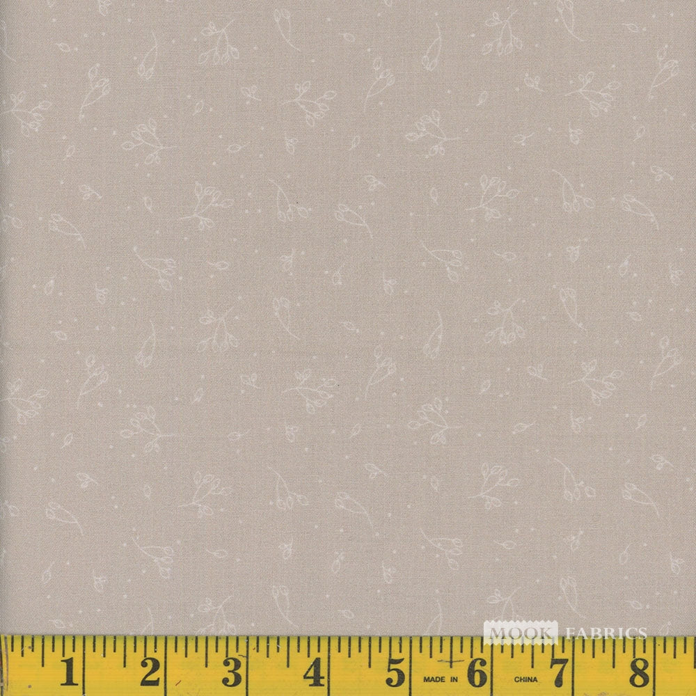Light beige fabric with subtle floral pattern and a ruler at the bottom for scale.