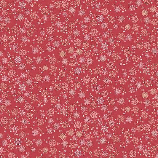 Red fabric with small white snowflake pattern
