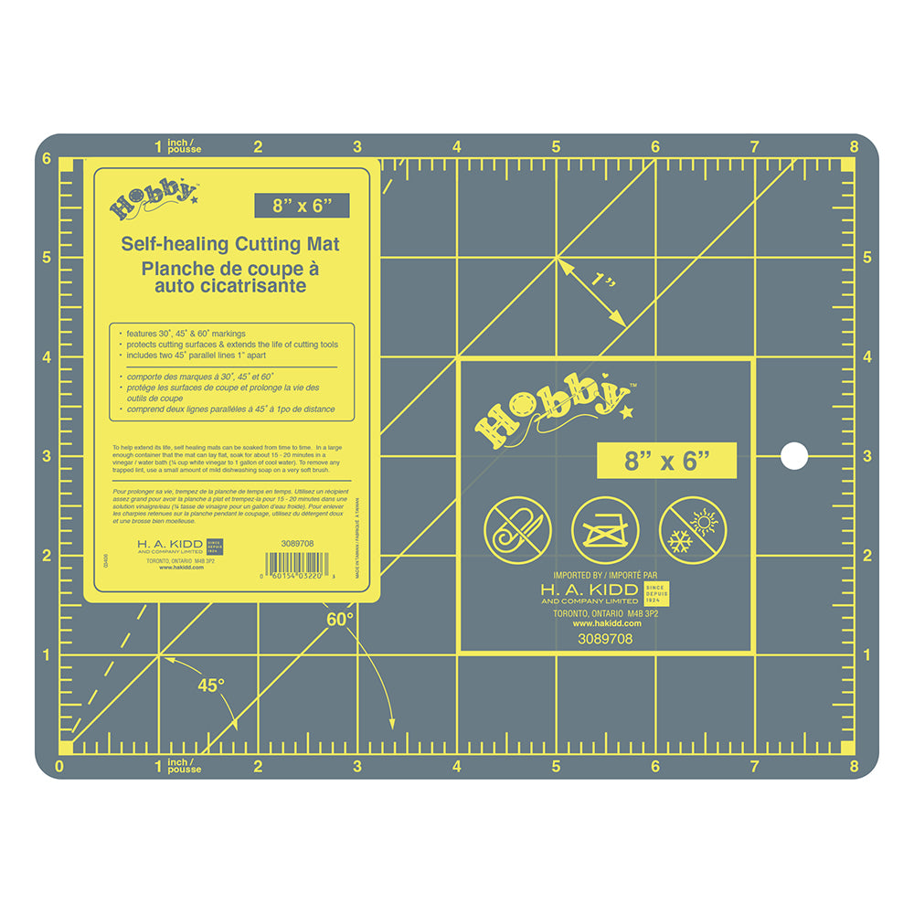 Hobby self-healing cutting mat with grid lines and measurements on a white background