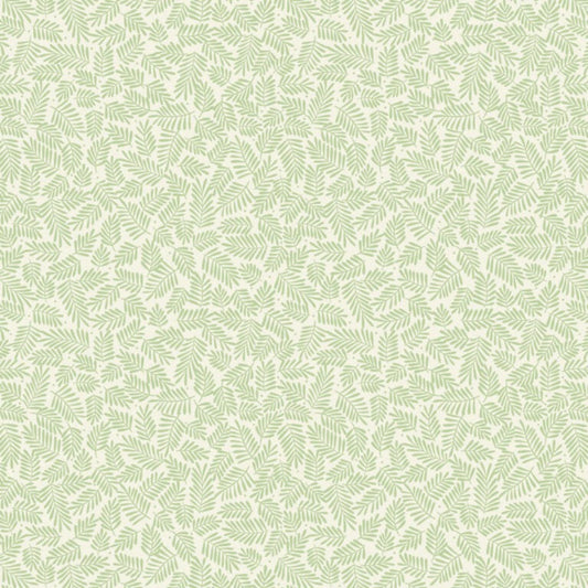 Pattern of green leaves on a light beige background