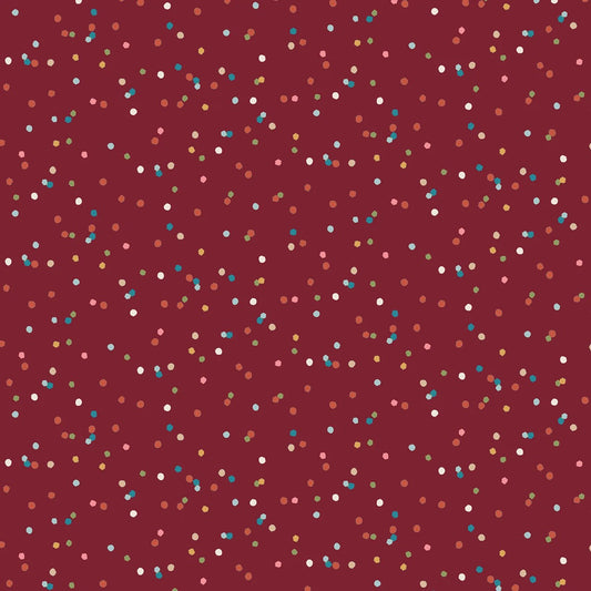 A repeating confetti pattern of small multicolored dots on a deep burgundy background.
