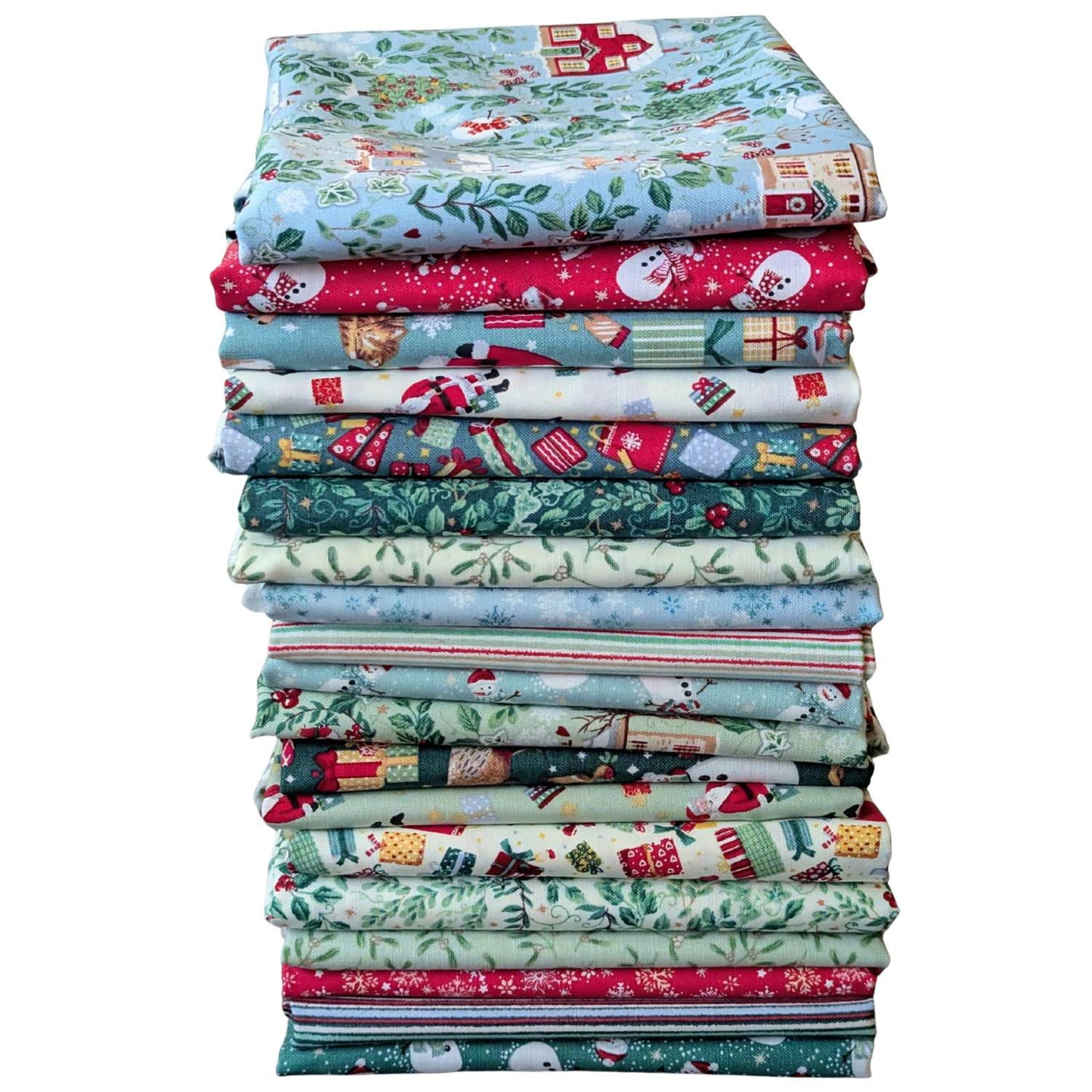 Stack of Christmas-themed fabric panels on a white background