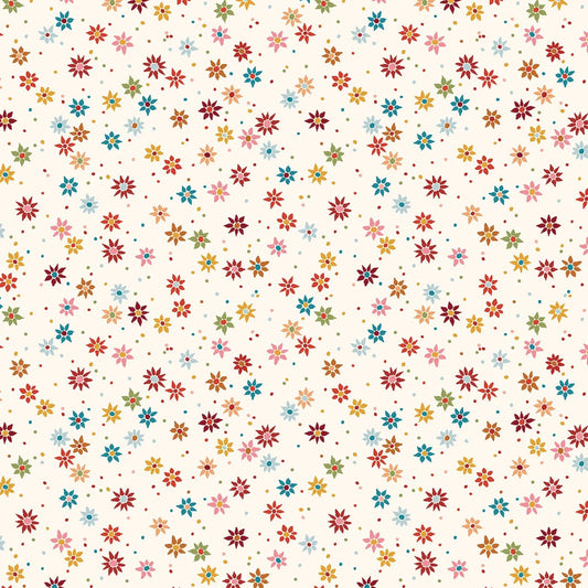 A repeating pattern of small multicolored starburst flowers and tiny dots on a warm cream background.