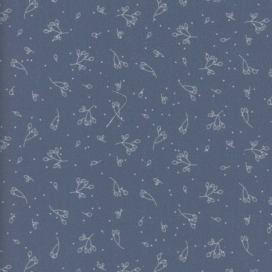 Navy blue fabric with small white floral pattern