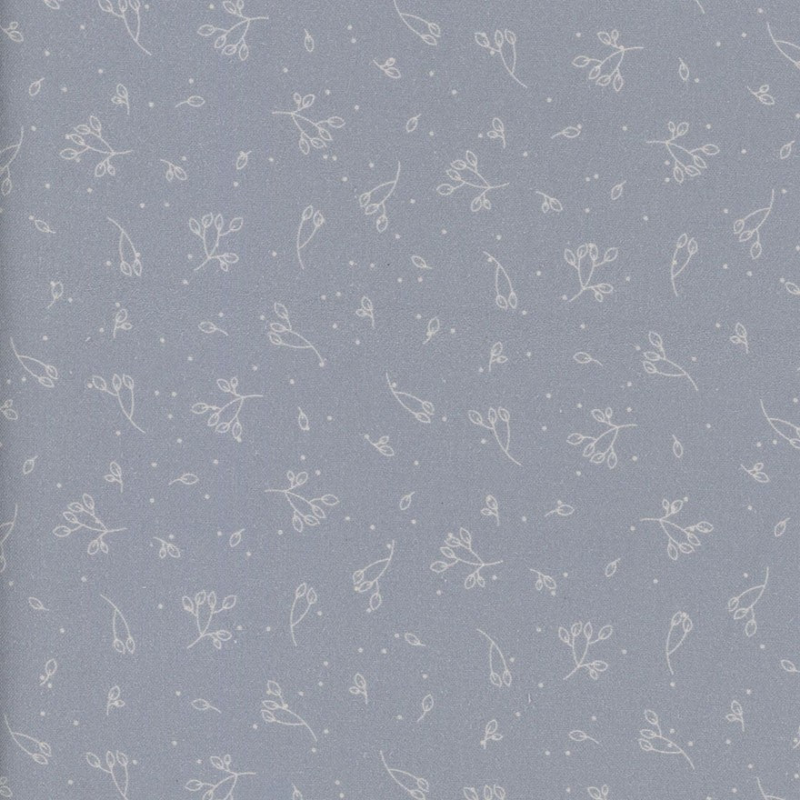 Pattern of small white floral outlines on a light blue background
