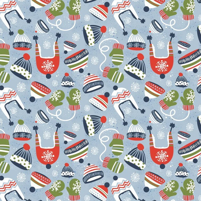 A repeating holiday pattern featuring stylized knit hats, mittens, and gloves in red, green, navy, cream, and white on a light blue background.