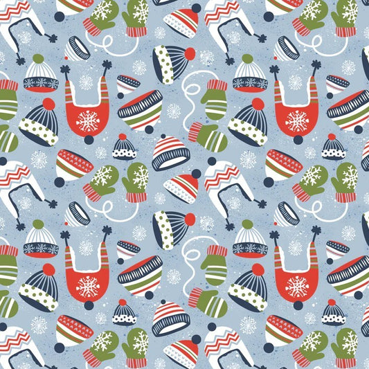 A repeating holiday pattern featuring stylized knit hats, mittens, and gloves in red, green, navy, cream, and white on a light blue background.
